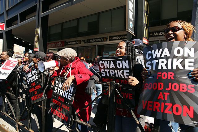 Verizon workers outside a Brooklyn Verizon office